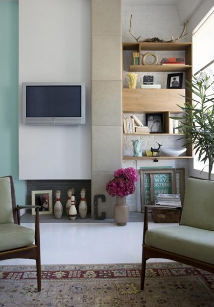 H&H living rm. fireplace shelf offset displaying objects